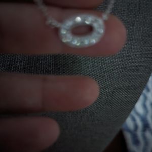 Silver and crystal faux diamond pendant